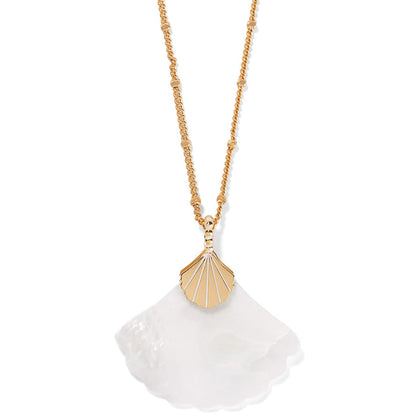 Brighton pendant necklace with gold-plated shell charm and mother-of-pearl fan drop on a white background