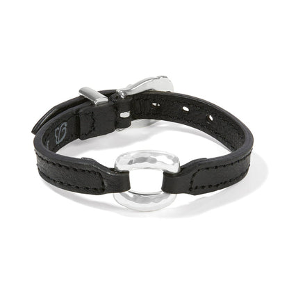 Brighton black leather bracelet with hammered silver-plated oval ring center and adjustable buckle closure on a white background