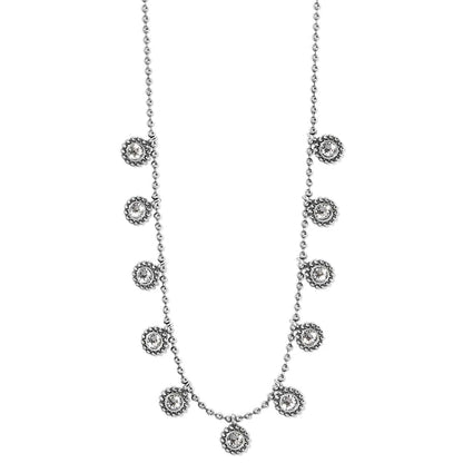 Brighton necklace with silver-plated beaded chain and crystal floral station accents spaced along the strand on a white background