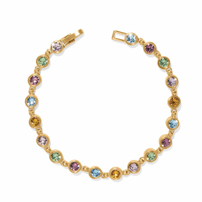Brighton gold-plated bracelet with multicolored crystals in green, purple, blue, and amber bezel settings on a white background