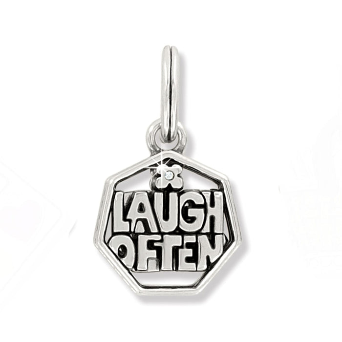 Brighton charm with hexagonal frame reading Laugh Often, flower accent, and crystal detail on a white background