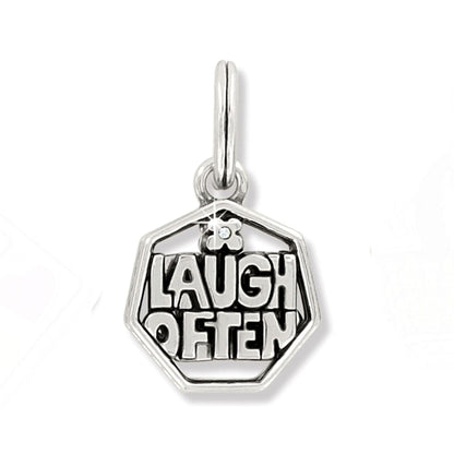 Brighton charm with hexagonal frame reading Laugh Often, flower accent, and crystal detail on a white background