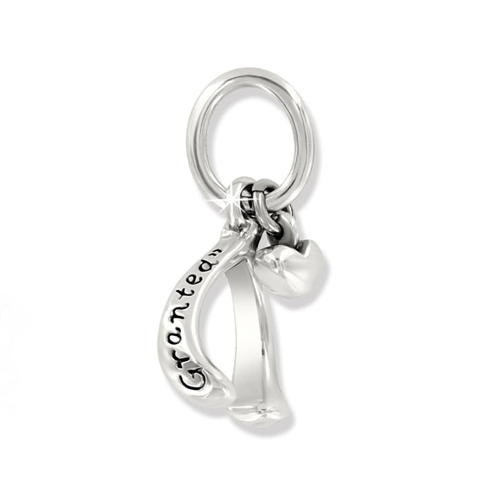 Brighton silver-plated wishbone charm engraved with Granted, paired with a heart charm on a white background